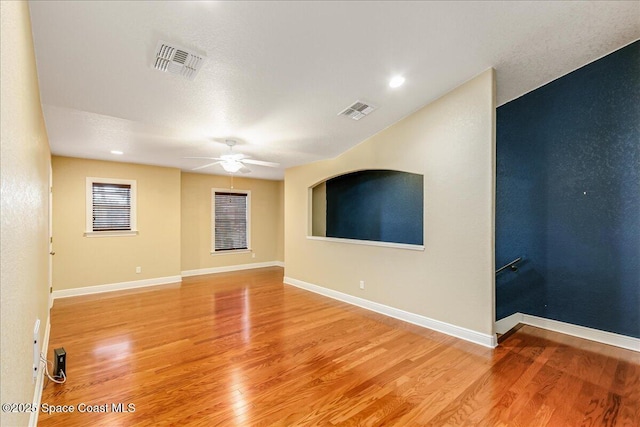 1390 Isabella Dr Unit 106, Melbourne, FL 32935 - empty room with a ceiling fan, light wood-type flooring, and recessed lighting