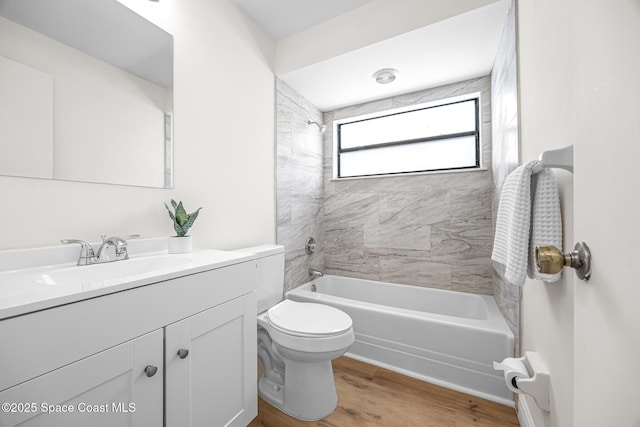 890 Yorktowne Dr, Rockledge, FL 32955 - full bathroom with vanity, shower / tub combination, and wood finished floors