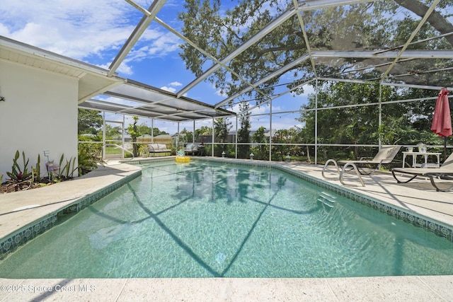 1242 Creel Rd NE, Palm Bay, FL 32905 - outdoor pool featuring a patio area and a lanai