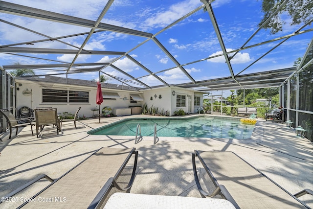 1242 Creel Rd NE, Palm Bay, FL 32905 - outdoor pool featuring a patio area and a lanai