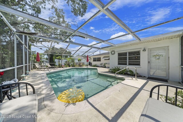 1242 Creel Rd NE, Palm Bay, FL 32905 - outdoor pool with a patio and a lanai