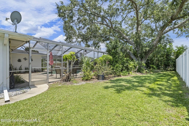 1242 Creel Rd NE, Palm Bay, FL 32905 - view of yard with a patio, glass enclosure, and an outdoor pool