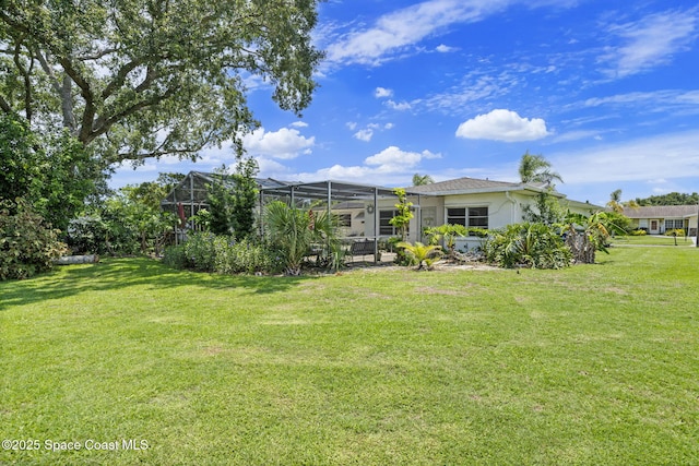 1242 Creel Rd NE, Palm Bay, FL 32905 - view of grassy yard featuring glass enclosure