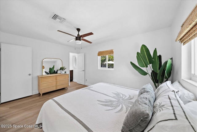 212 Ormond Dr, Indialantic, FL 32903 - bedroom featuring light wood-style floors and ceiling fan