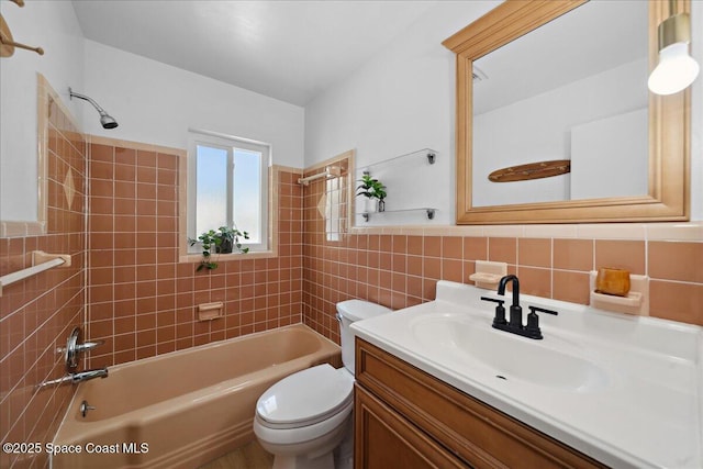 212 Ormond Dr, Indialantic, FL 32903 - full bathroom with shower / bath combination, vanity, and tile walls