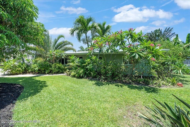 212 Ormond Dr, Indialantic, FL 32903 - view of green lawn