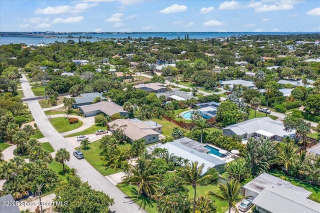 212 Ormond Dr, Indialantic, FL 32903 - aerial view of residential area featuring a nearby body of water and a notable bridge