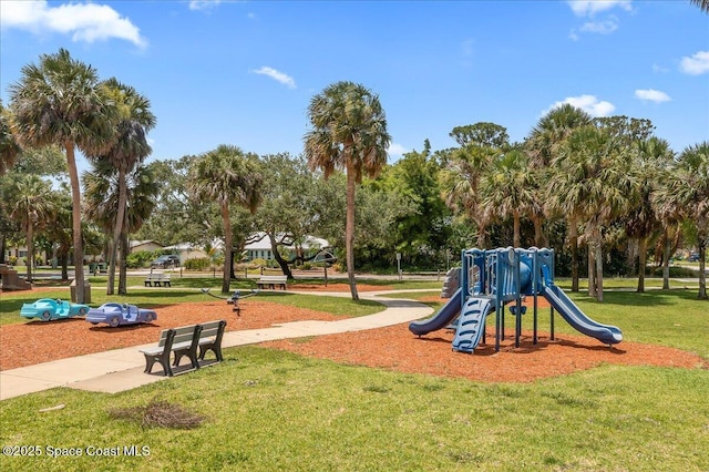 212 Ormond Dr, Indialantic, FL 32903 - communal playground featuring a lawn
