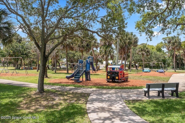 212 Ormond Dr, Indialantic, FL 32903 - community jungle gym featuring a lawn