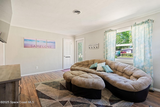 1949 36th Ave, Vero Beach, FL 32960 - living area featuring ornamental molding and wood finished floors