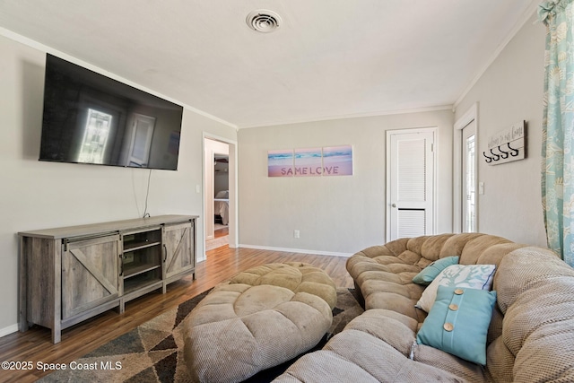 1949 36th Ave, Vero Beach, FL 32960 - living room with wood finished floors and crown molding