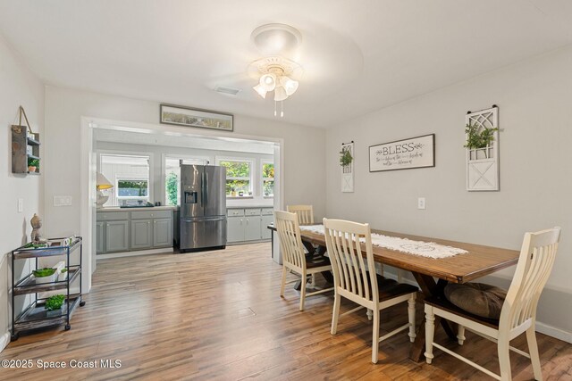 1949 36th Ave, Vero Beach, FL 32960 - dining area with light wood-type flooring and ceiling fan