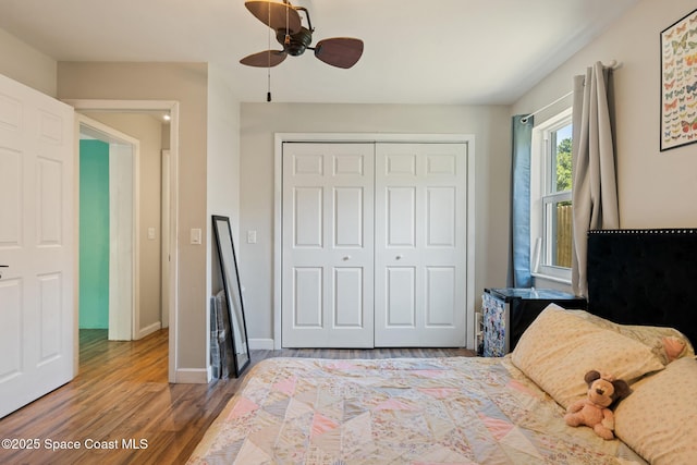 1949 36th Ave, Vero Beach, FL 32960 - bedroom featuring wood finished floors, a closet, and a ceiling fan