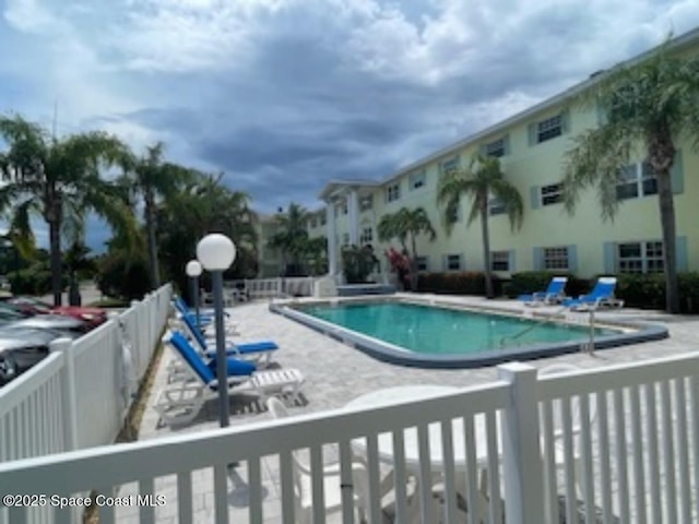 230 Columbia Dr Unit 208, Cape Canaveral, FL 32920 - community pool with a patio