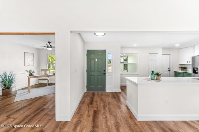 865 Southern Pine Trl, Rockledge, FL 32955 - entrance foyer with wood finished floors, a ceiling fan, and recessed lighting