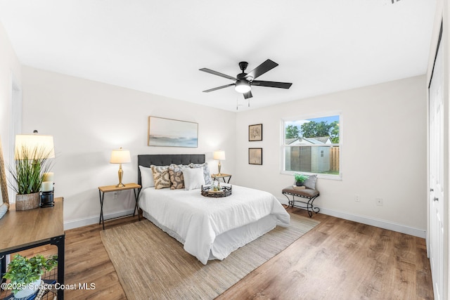 865 Southern Pine Trl, Rockledge, FL 32955 - bedroom with wood finished floors and ceiling fan