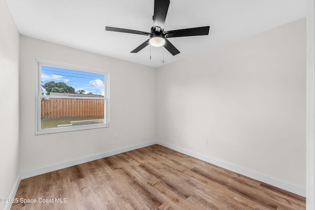 865 Southern Pine Trl, Rockledge, FL 32955 - empty room featuring wood finished floors and ceiling fan