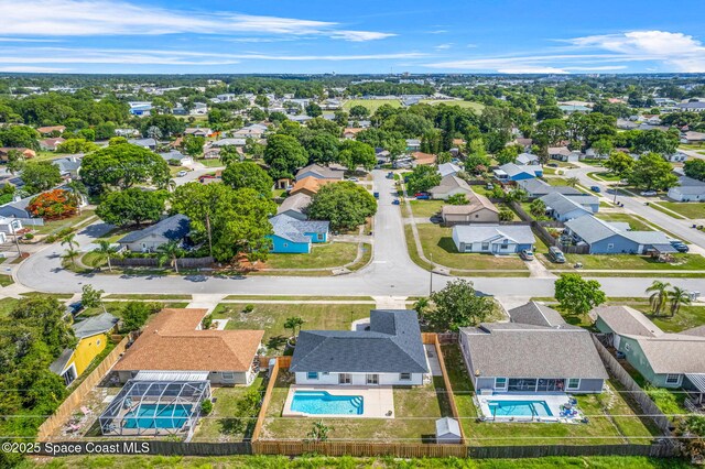 865 Southern Pine Trl, Rockledge, FL 32955 - aerial perspective of suburban area with a pool