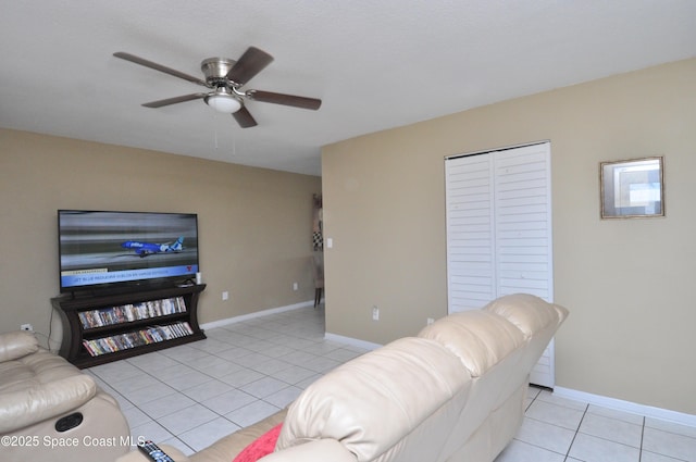 2938 Chipper Dr NE, Palm Bay, FL 32905 - living area with light tile patterned flooring and a ceiling fan