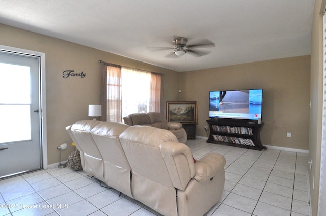2938 Chipper Dr NE, Palm Bay, FL 32905 - living room with light tile patterned flooring and a ceiling fan