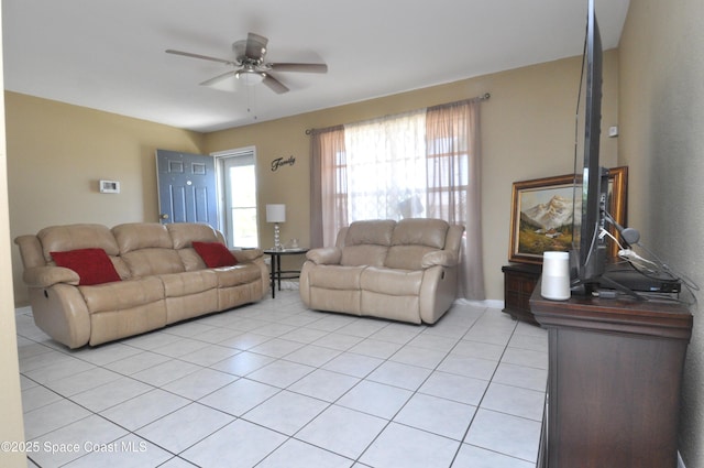2938 Chipper Dr NE, Palm Bay, FL 32905 - living area with ceiling fan and light tile patterned flooring