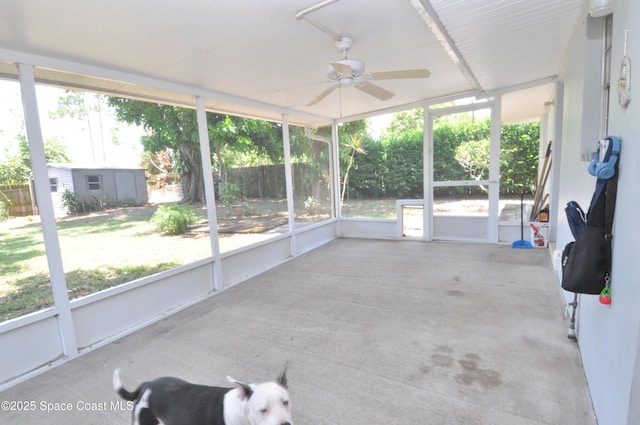 2938 Chipper Dr NE, Palm Bay, FL 32905 - unfurnished sunroom featuring ceiling fan and plenty of natural light