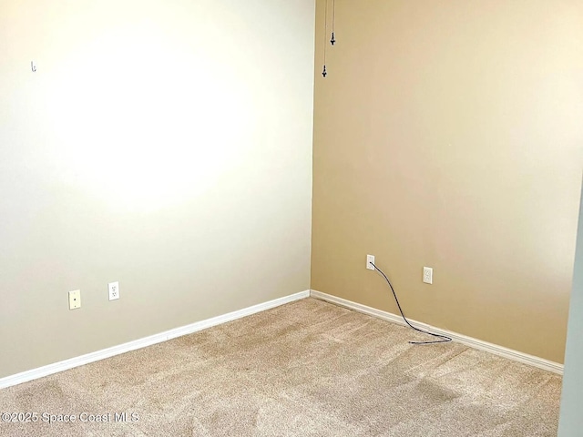 2324 Addington Cir, Rockledge, FL 32955 - spare room featuring light carpet and baseboards