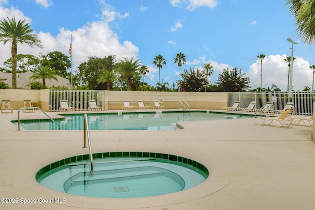 2324 Addington Cir, Rockledge, FL 32955 - community pool featuring a hot tub and a patio