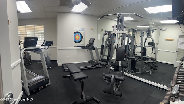 2324 Addington Cir, Rockledge, FL 32955 - exercise room with a drop ceiling and baseboards