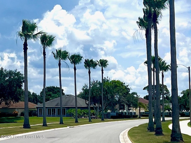 2324 Addington Cir, Rockledge, FL 32955 - view of asphalt road with street lights