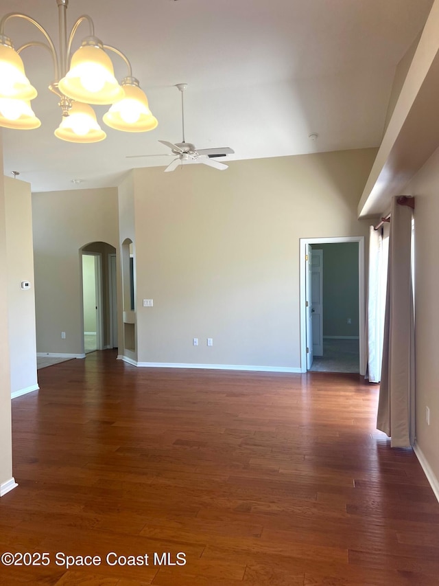 2324 Addington Cir, Rockledge, FL 32955 - spare room with arched walkways, ceiling fan, and wood finished floors