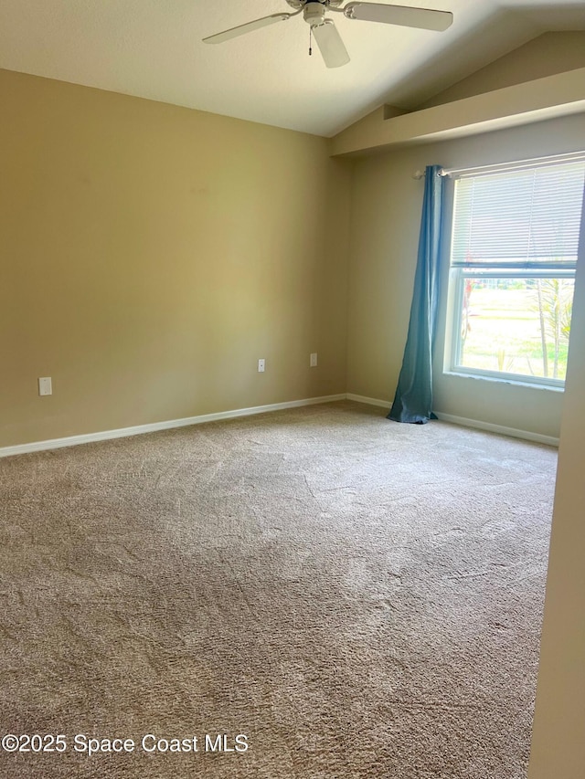 2324 Addington Cir, Rockledge, FL 32955 - empty room with vaulted ceiling, carpet flooring, and ceiling fan