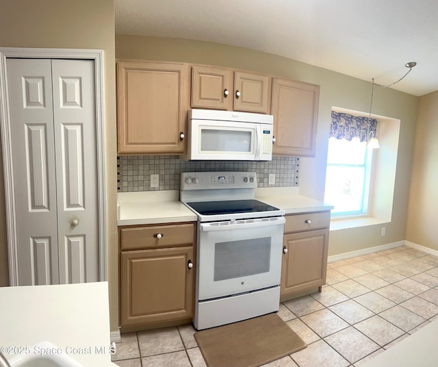 2324 Addington Cir, Rockledge, FL 32955 - kitchen with white appliances, light tile patterned floors, light countertops, backsplash, and light brown cabinets