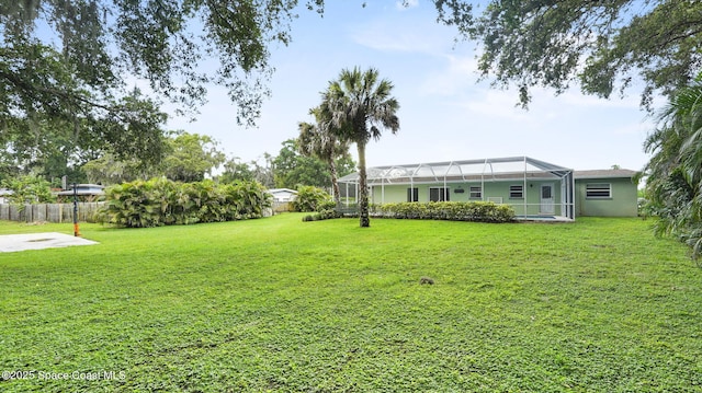 2009 Vaughn St, Titusville, FL 32796 - view of yard featuring a lanai