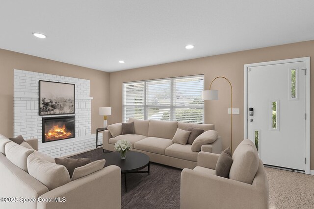 2009 Vaughn St, Titusville, FL 32796 - living room with a fireplace, recessed lighting, and carpet flooring