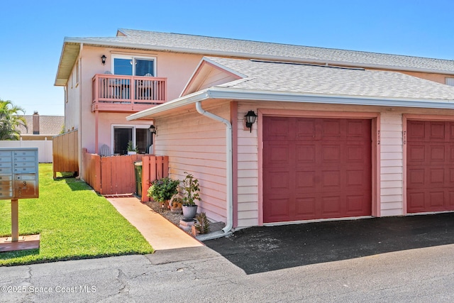 712 Sea Palm Ln, Satellite Beach, FL 32937 - view of front of home featuring a shingled roof, a balcony, and driveway