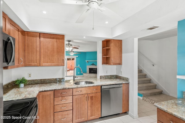 712 Sea Palm Ln, Satellite Beach, FL 32937 - kitchen featuring stainless steel dishwasher, black range with electric stovetop, ceiling fan, brown cabinets, and open shelves