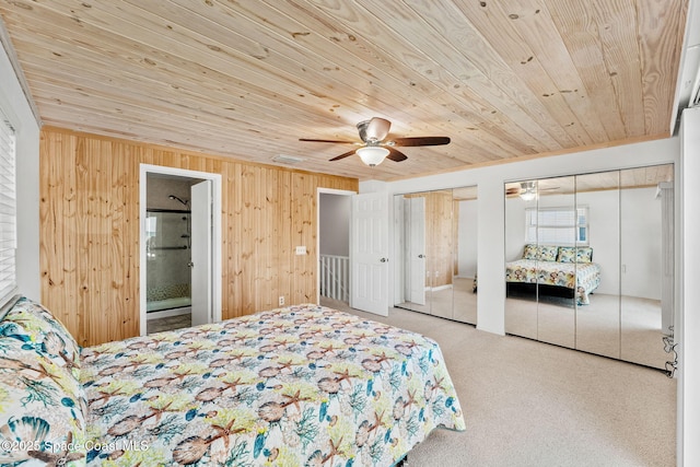 712 Sea Palm Ln, Satellite Beach, FL 32937 - bedroom featuring multiple closets, carpet flooring, wooden ceiling, wood walls, and a ceiling fan