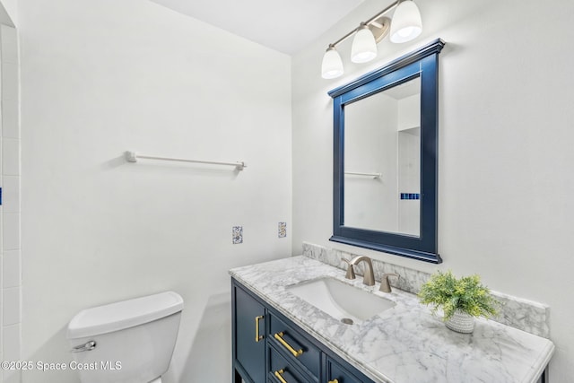 712 Sea Palm Ln, Satellite Beach, FL 32937 - bathroom with vanity and toilet