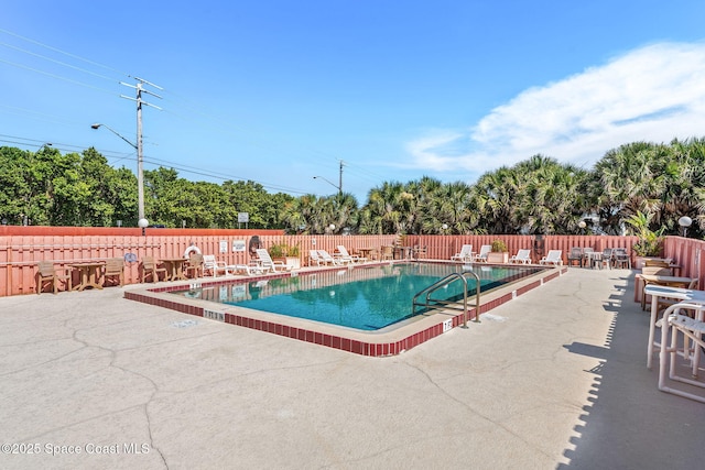 712 Sea Palm Ln, Satellite Beach, FL 32937 - community pool with a patio