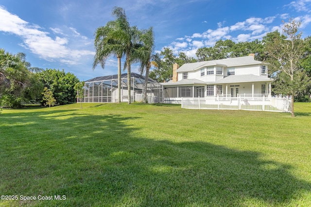 2123 Royal Oaks Dr, Rockledge, FL 32955 - view of yard featuring a lanai