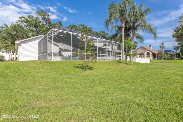 2123 Royal Oaks Dr, Rockledge, FL 32955 - view of grassy yard featuring glass enclosure