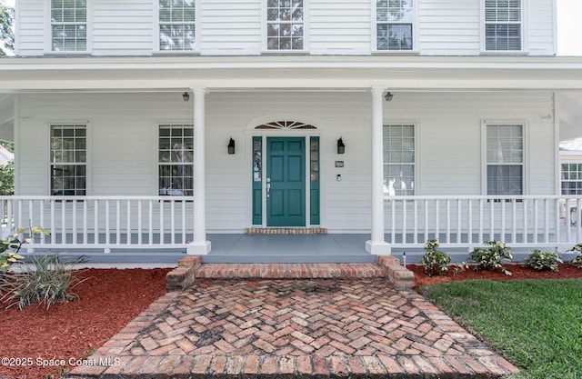 2123 Royal Oaks Dr, Rockledge, FL 32955 - property entrance featuring a porch