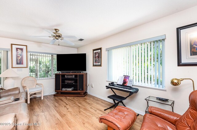 112 Plover Ln Unit 6-33, Rockledge, FL 32955 - living room featuring light wood-style floors and ceiling fan