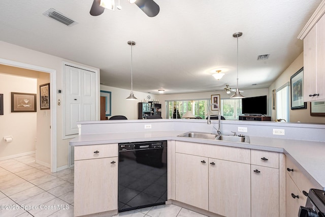 112 Plover Ln Unit 6-33, Rockledge, FL 32955 - kitchen featuring black dishwasher, light countertops, ceiling fan, and decorative light fixtures