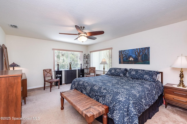 112 Plover Ln Unit 6-33, Rockledge, FL 32955 - bedroom with carpet flooring and a ceiling fan