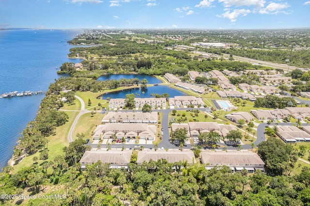 112 Plover Ln Unit 6-33, Rockledge, FL 32955 - aerial perspective of suburban area with a nearby body of water