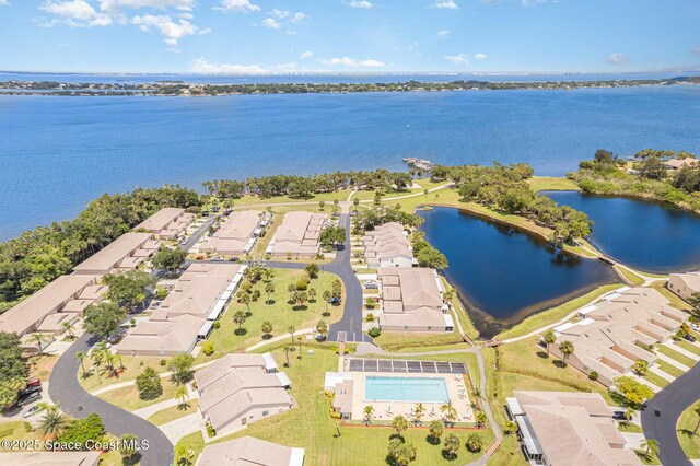 112 Plover Ln Unit 6-33, Rockledge, FL 32955 - aerial perspective of suburban area with a large body of water and a pool