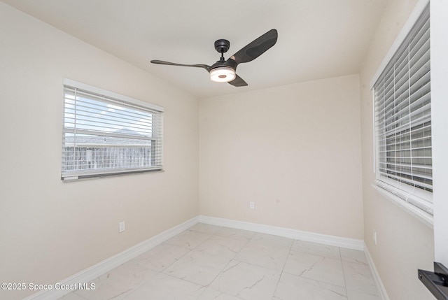 1245 Arlington Cir, Merritt Island, FL 32952 - unfurnished room with light marble finish flooring and ceiling fan