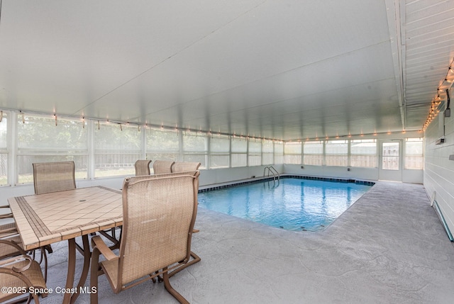 1245 Arlington Cir, Merritt Island, FL 32952 - indoor pool with a patio area